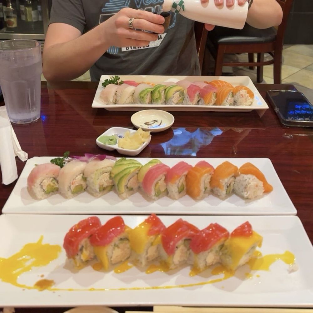 Hot sake with a rainbow and tuna mango roll Hot sake with a rainbow and tuna mango roll
