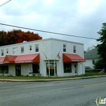 Foxwell Floor Covering - a white building with a red awning - Carpeting Near Me - Annapolis, Maryland Foxwell Floor Covering - a white building with a red awning - Carpeting Near Me - Annapolis, Maryland