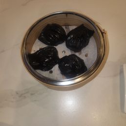 Black truffle soup dumpling Black truffle soup dumpling