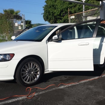 Solar Care Window Tinting - the Solar Care crew tinting my rear door windows, quarter glass, and rear hatch. - Home Window Tinting Near Me
