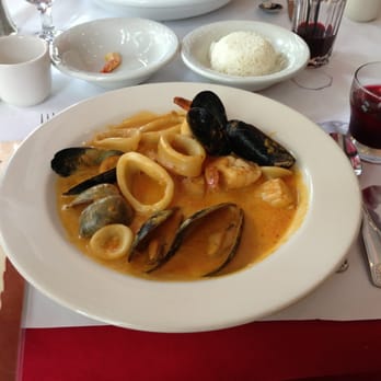 INTI Peruvian Restaurant - Corvina a lo macho - Peruvian Near Me - New York, New York INTI Peruvian Restaurant - Corvina a lo macho - Peruvian Near Me - New York, New York