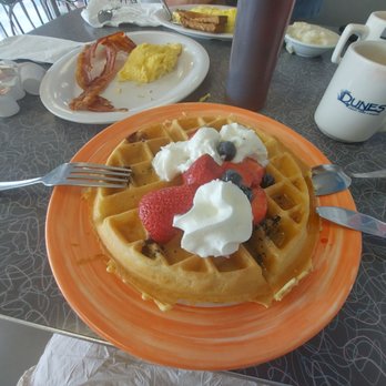 Grits Grill - Red, white & blue waffle with strawberries,  blueberries and whipped cream , scramble eggs,  bacon - American Near Me - Nags Head, North Carolina
