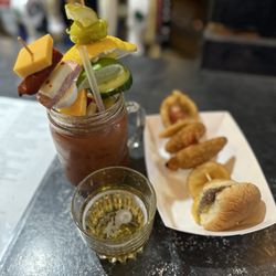 Spoondogger's - So many fixings they would have tipped the glass over! Great tasting Bloody!!!
