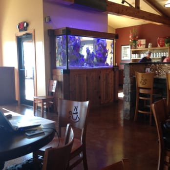 Mad Coffee and More - Large aquarium in seating area - Coffee & Tea Near Me - Abilene, Texas