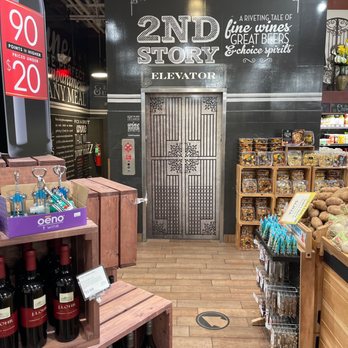 The Fresh Market - Lift to second floor beer, wine & seating area - Grocery Near Me - New Orleans, Louisiana The Fresh Market - Lift to second floor beer, wine & seating area - Grocery Near Me - New Orleans, Louisiana