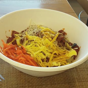 BIBIBOP Asian Grill - Spicy chicken with teriyaki sauce topped with carrots, eggs, and cheddar over white rice. - Asian Fusion Near Me - Columbus, Ohio