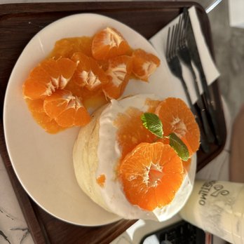 Nostimo Cafe & Tea - Another view of the souffle! Look at how much Tangerines they give me! - Coffee & Tea Near Me - Westminster, California Nostimo Cafe & Tea - Another view of the souffle! Look at how much Tangerines they give me! - Coffee & Tea Near Me - Westminster, California