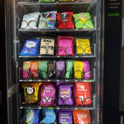Snowpack Taproom & Pizzeria - Inappropriate adult vending machine in front lobby inside main entrance of Pizzeria.