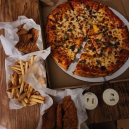 Large burger pizza. 2 orders of chicken tenders and a large fry. 2 tiny cups of dipping sauce. Large burger pizza. 2 orders of chicken tenders and a large fry. 2 tiny cups of dipping sauce.