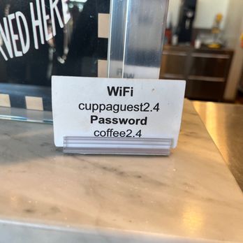 Cuppa Tosa - a close up of a sign on a counter - Cafes Near Me - Wauwatosa, Wisconsin