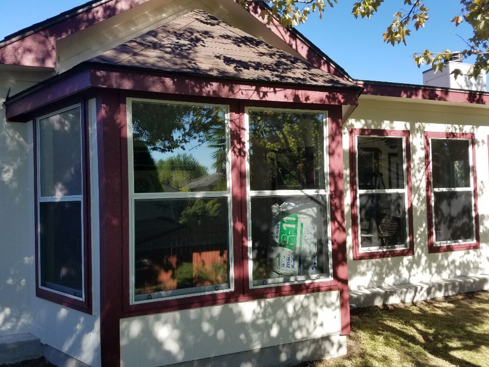 Slide of Alex Roofing and Remodeling