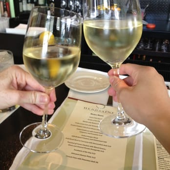 Herbsaint - Enjoying wine at the bar - French Near Me - New Orleans, Louisiana Herbsaint - Enjoying wine at the bar - French Near Me - New Orleans, Louisiana