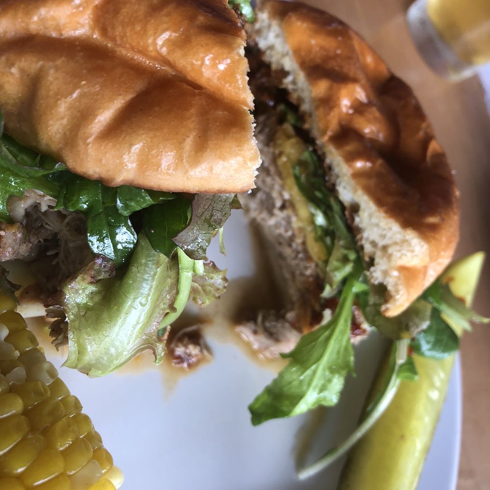 Lost Nation Brewing - Braised jerk chicken with pineapple on challah with corn on the cob. - Breweries Near Me - Morrisville, Vermont Lost Nation Brewing - Braised jerk chicken with pineapple on challah with corn on the cob. - Breweries Near Me - Morrisville, Vermont