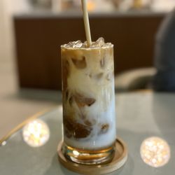 Carpe Diem Cafe - Iced caramel latte with almond milk
