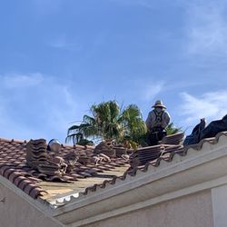 D&L Roofing - Repairs being made to our roof, the workers cleaned up very well after the job was complete.