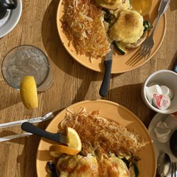 SB Sunshine Cafe - SB Sunshine Benedict - one with Canadian bacons and one with crab cakes