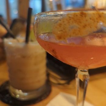 Vida Agave - New drink owner wanted us to try (the one in the back) Aperol coconut margarita ! DELISH - Tacos Near Me - Galveston, Texas