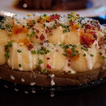 Cino - Twice baked potato - creme fraiche, cheese, chives, and crispy pancetta - Italian Near Me - Honolulu, Hawaii
