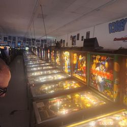 One of the many rows of pinball machines.