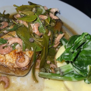 Noble Rot Wine Bar - Roasted Cornish Hake with brown shrimp & capers - Wine Bars Near Me - London, XGL Noble Rot Wine Bar - Roasted Cornish Hake with brown shrimp & capers - Wine Bars Near Me - London, XGL