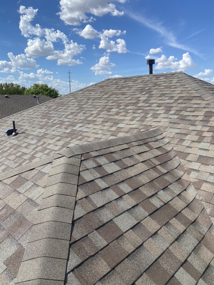 Slide of Regio's Roofing