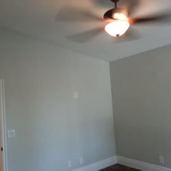 Brilliant Electric - Ceiling fan and light, controlled by dual dimmer. Decora white tamper proof receptacle devices.