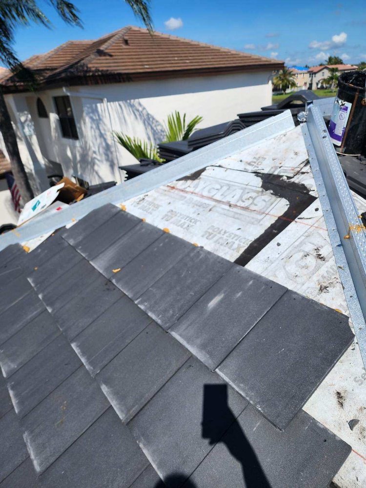 Slide of BMG Roofing