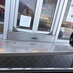 This pick up window is dirty and has not been attended to for several days