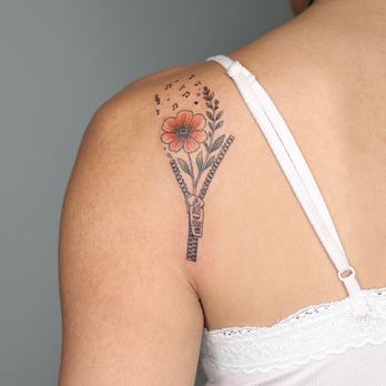 Inkverse Tattoo Studio - Indian blanket flower within zipper and music notes above - Tattoo Near Me - Katy, Texas Inkverse Tattoo Studio - Indian blanket flower within zipper and music notes above - Tattoo Near Me - Katy, Texas