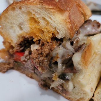 Chicky's Grill & Pizza - a sandwich cut in half - Pizza Near Me - Stamford, Connecticut Chicky's Grill & Pizza - a sandwich cut in half - Pizza Near Me - Stamford, Connecticut