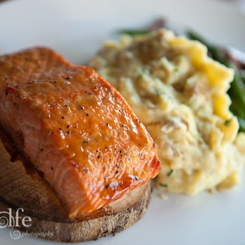 J Gilbert's - Maple Plank Bourbon Salmon dinner with yukon smashed potatoes, and green beans with pecans. - Seafood Near Me - Des Pers, Missouri J Gilbert's - Maple Plank Bourbon Salmon dinner with yukon smashed potatoes, and green beans with pecans. - Seafood Near Me - Des Pers, Missouri