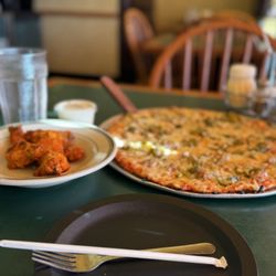 Monical's Pizza - Hot Wings and thin pizza w/ sausage and jalapeños!
