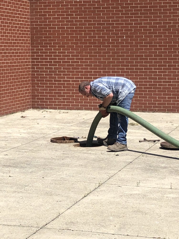 Slide of Brown Drain Service