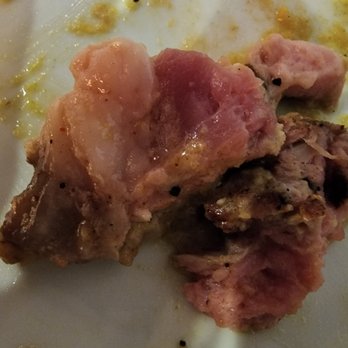 Poppycocks - Pork Ribeye bad ending - New American Near Me - Traverse City, Michigan