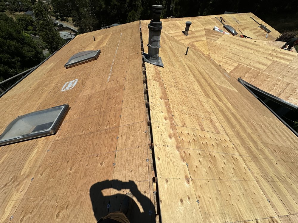 Slide of Vigil Roofing