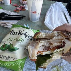 Copper Spike Cafe - Turkey sandwich piled high with boars head meat and jalapeño chips