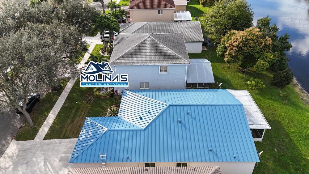 Slide of Molina's Roofing Services