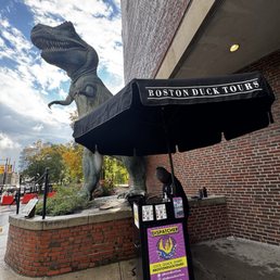Check in here by the big dinosaur