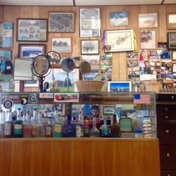 Bailey's Barber Shop - 30+ aftershaves and plenty of mirrors. Authentic barbershop.