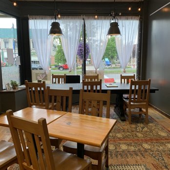 Dalai Java - a dining room with a table and chairs - Cafes Near Me - Canandaigua, New York