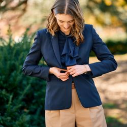The Ethical Aesthete - Styled by The Ethical Aesthete. Personal stylist for women. A ruffled silk blouse is a gorgeous counterpoint to the Katharine Hepburn pant.
