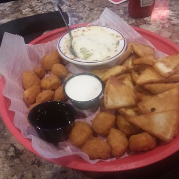 The Colorado Grill - Appetizer sampler - artichoke spinach dip with pita bread, corn nuggets, and cheese ball type things. Forgot the name. - American Near Me - Boone, Iowa The Colorado Grill - Appetizer sampler - artichoke spinach dip with pita bread, corn nuggets, and cheese ball type things. Forgot the name. - American Near Me - Boone, Iowa
