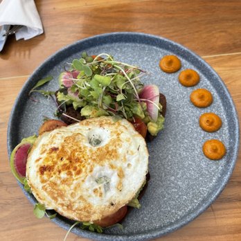 The Real Coconut - Avocado "toast" on plantain bread - Salad Near Me - Tulum, ROO The Real Coconut - Avocado "toast" on plantain bread - Salad Near Me - Tulum, ROO