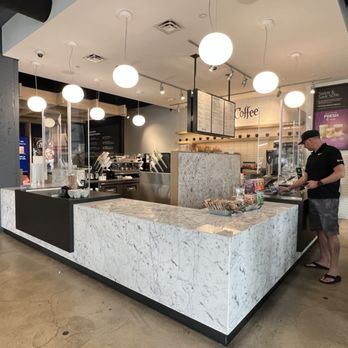 Capital One Café - a man standing at the counter - Banks & Credit Unions Near Me - Delray Beach, Florida Capital One Café - a man standing at the counter - Banks & Credit Unions Near Me - Delray Beach, Florida