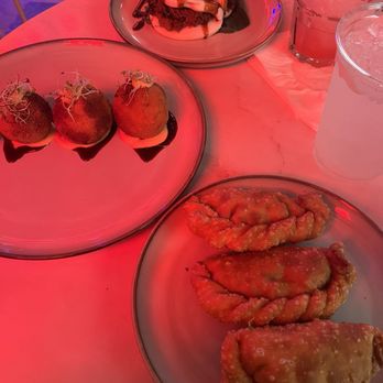 Pira Rum - Empanadas, buns and I can't remember the other time but it has beans, rice and sweet plantain in it. - Tapas Bars Near Me - San Juan, Puerto Rico