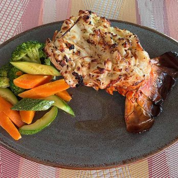 El Caribeno Restaurant - Large lobster tail entree. - Caribbean Near Me - Cancún, ROO El Caribeno Restaurant - Large lobster tail entree. - Caribbean Near Me - Cancún, ROO