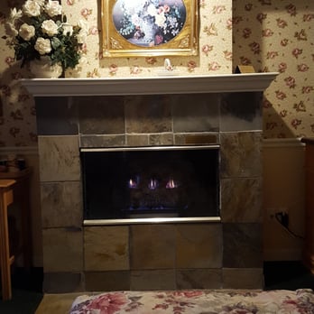 Ascot Suites - The fireplace in our room. - Hotels Near Me - Morro Bay, California
