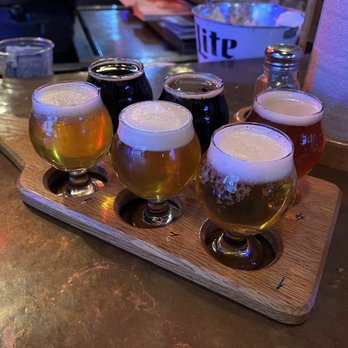 Dreamland BBQ - Flight of six of their house brewed beers. - Barbeque Near Me - Montgomery, Alabama Dreamland BBQ - Flight of six of their house brewed beers. - Barbeque Near Me - Montgomery, Alabama