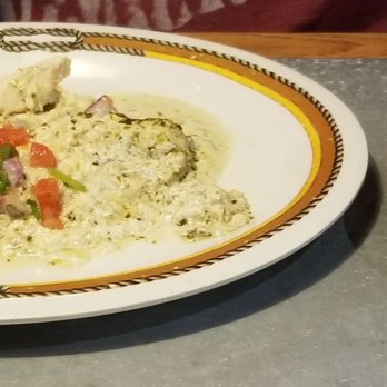 Cowboy Chicken - 2 chicken enchiladas topped with their tomatillo sour cream sauce and a side of corn nuggets. - Southern Near Me - Longview, Texas