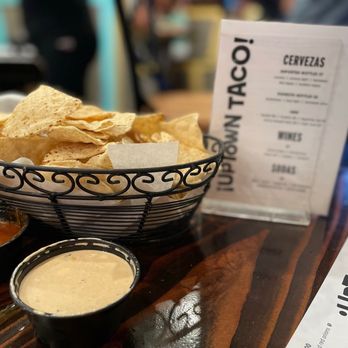 Uptown Taco - a bowl of tortillas and dips - Tacos Near Me - Floral Park, New York